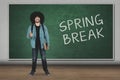 Student with ok sign and spring break word