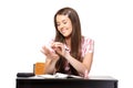 Student painting her nails in classroom Royalty Free Stock Photo