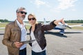 student pilot and instructor going through pre-flight pilot checklist