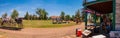 Student playing baseball in Wyoming Territorial Prison