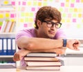 Student preparing for exams with many conflicting priorities Royalty Free Stock Photo