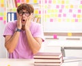 Student preparing for exams with many conflicting priorities Royalty Free Stock Photo