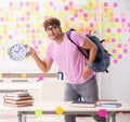 Student preparing for exams with many conflicting priorities Royalty Free Stock Photo