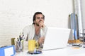 Student preparing university project or hipster style freelancer businessman working with laptop Royalty Free Stock Photo