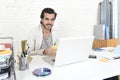 Student preparing university project or hipster style freelancer businessman working with laptop Royalty Free Stock Photo