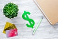 Student`s desk with dollar sign for fee-paying education set gray background top view mock up Royalty Free Stock Photo