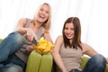 Student series - Two young woman watching TV Royalty Free Stock Photo