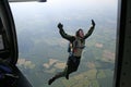 Student skydiver jumps from an airplane Royalty Free Stock Photo