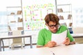 The student struggling at the exam in classroom Royalty Free Stock Photo