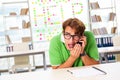 The student struggling at the exam in classroom Royalty Free Stock Photo