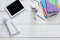 Student table with tablet and diary background