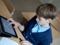 Student and tablet in classroom