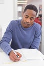 Student taking notes in class Royalty Free Stock Photo