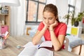 Student teenage girl reading book at home Royalty Free Stock Photo