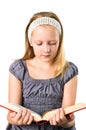 A student teenager girl reading a book Royalty Free Stock Photo