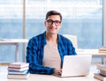 Student in telelearning distance learning concept reading in lib Royalty Free Stock Photo