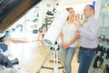 Student in telescope shop Royalty Free Stock Photo