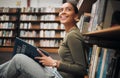 Student, thinking and reading books library floor for knowledge, college education and research planning. University Royalty Free Stock Photo