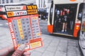 Student or tourism holding the Brighton & Hove seven day saver bus pass ticket inside the public bus route. Royalty Free Stock Photo