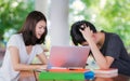 Student tutor teach her friend before examinatuin in out door li