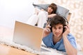 Student - Two teenager with laptop and headphones Royalty Free Stock Photo