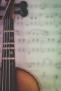 Student Violin Closeup over blurred sheet music Royalty Free Stock Photo