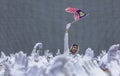 Student waving Malaysia flag also known as Jalur Gemilang Royalty Free Stock Photo