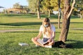 Student wearing a mask studying