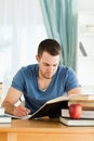Student working through subject materials Royalty Free Stock Photo