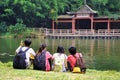 STUDENT YOUNG FRIENDS BY LAKE