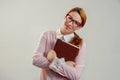 Student young girl woman holding books laptop smiling outside Royalty Free Stock Photo