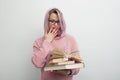 Student. Young Shocked woman with books. Student girl with a stack of books, Royalty Free Stock Photo