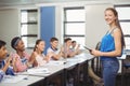 Students appreciating classmate after presentation in classroom