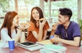 Students asian group together eating pizza in breaking time Royalty Free Stock Photo