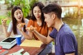 Students asian group together eating pizza in breaking time Royalty Free Stock Photo