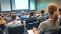 Students attentively listening to lecture in modern classroom setting