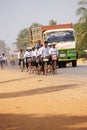 Students bicycle home from school