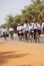 Students bicycle home from school