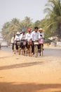 Students bicycle home from school