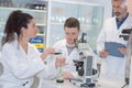 Students biologists and chemists in laboratory Royalty Free Stock Photo
