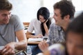 Students, books and reading in university class for education for academic exam for collage, scholarship or studying Royalty Free Stock Photo