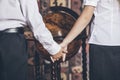 Students boy and girl holding hands on a background a globe Royalty Free Stock Photo