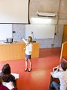 Students captivated by their beautiful teacher Royalty Free Stock Photo