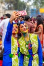 Students are celebrating Holi or `Basanta Utsav` at Rabindra Bharati University campus in Kolkata, India on 5th March 2020 Royalty Free Stock Photo