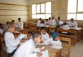 Students in class room during a lesson at school