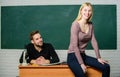 Students in classroom chalkboard background. Equal rights and liberties. Man and woman study university. Right education