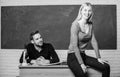 Students in classroom chalkboard background. Equal rights and liberties. Man and woman study university. Right education