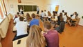 Students in the classroom are at their desks. Russian school.