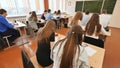 Students in the classroom are at their desks. Russian school. Royalty Free Stock Photo