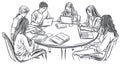 Students Studying Together Around a Table with Laptops and Books Royalty Free Stock Photo